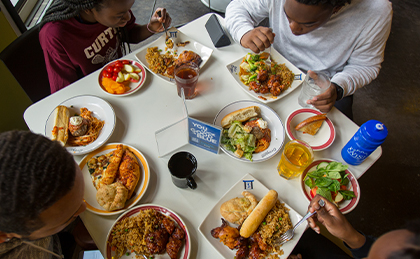 Top-down photo of students eating at Crossroads Culinary Center (C3)